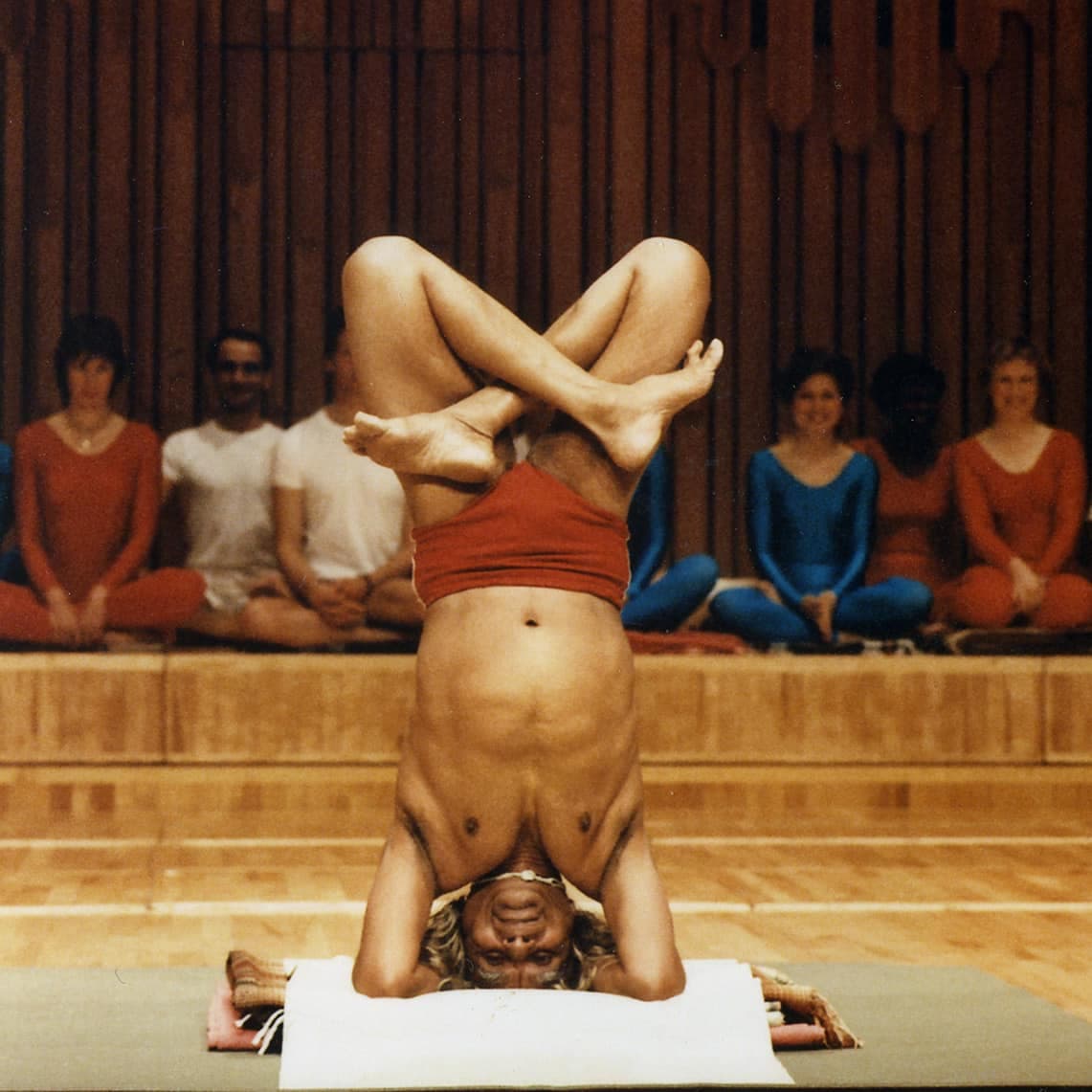 A bound headstand, held with control before the class
